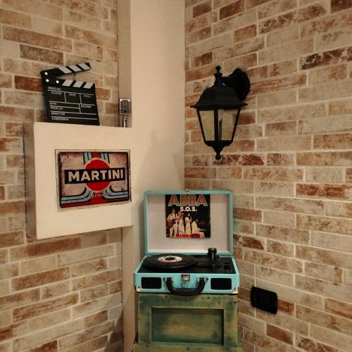 a brick wall with a stove in a room at Athena soggiorno in San Piero a Sieve