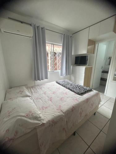 Postel nebo postele na pokoji v ubytování Apartamento da Paty