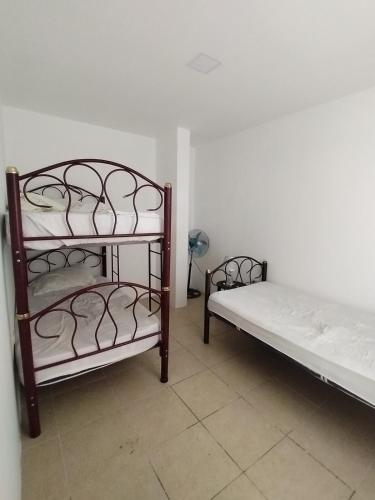 Postel nebo postele na pokoji v ubytování Casa Andrade in Coral 3 urbanization