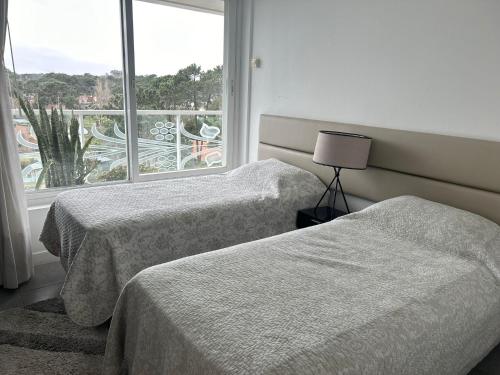 Ένα ή περισσότερα κρεβάτια σε δωμάτιο στο Yoo Punta Del Este