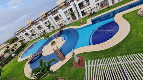 Bazén v ubytování Canoa Breeze - Apartment Roof Top nebo v jeho okolí