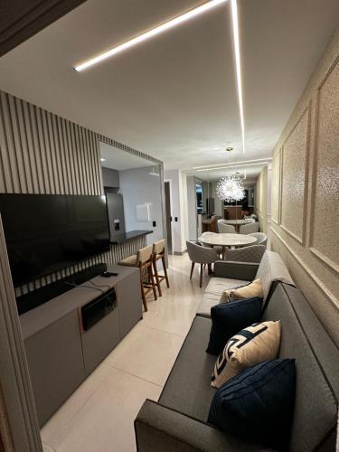TV a/nebo společenská místnost v ubytování Apartamento dos Sonhos