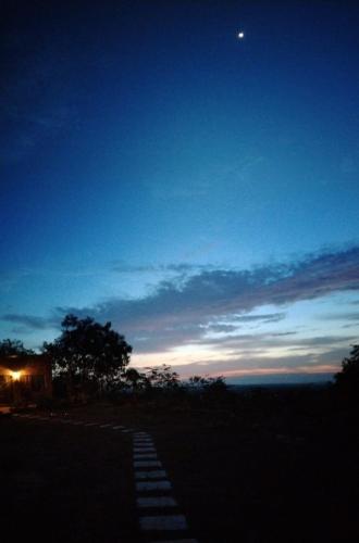 a night view of the sky with the moon at Wabi-Sabi House in Aguazul