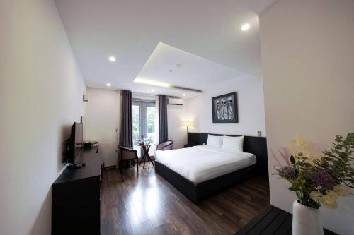Ein Bett oder Betten in einem Zimmer der Unterkunft Hotel The Hanoi Central City