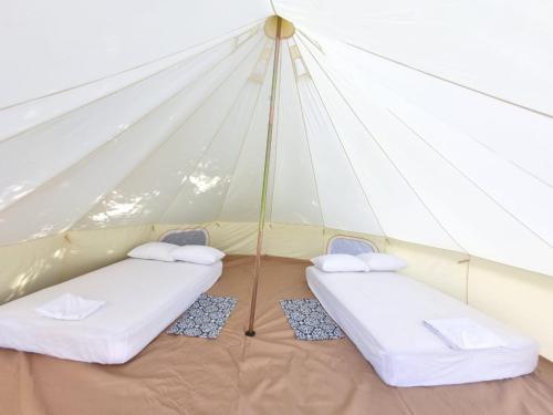 Postel nebo postele na pokoji v ubytování Glamping Jarahuco