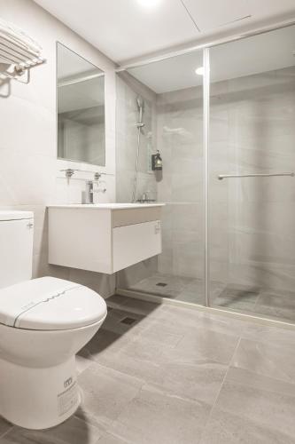 Koupelna v ubytování Mu Chen Hotel