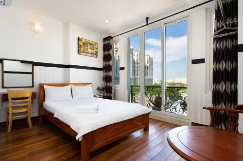 Postel nebo postele na pokoji v ubytování Lam Sơn Hotel 3 Tháng 2
