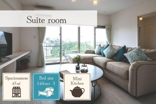 Χώρος καθιστικού στο Cozy Stay in Naha