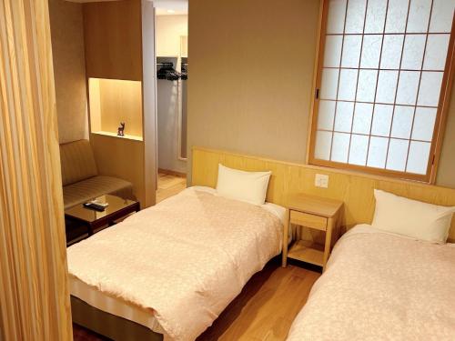 เตียงในห้องที่ Hotel Hanakomichi - Vacation STAY 27612v
