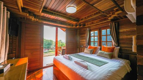 Postel nebo postele na pokoji v ubytování So View Phuket Resort
