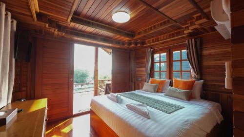 Postel nebo postele na pokoji v ubytování So View Phuket Resort