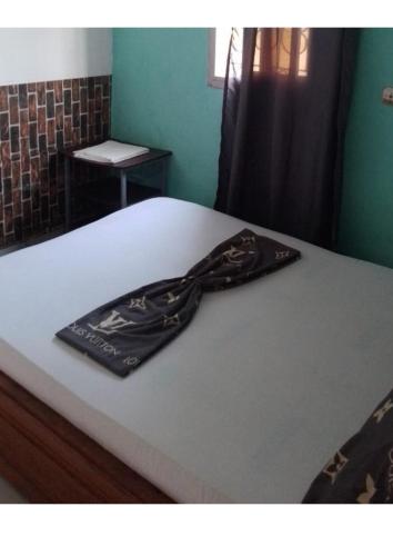 Postel nebo postele na pokoji v ubytování Hôtel Résidence le diamant