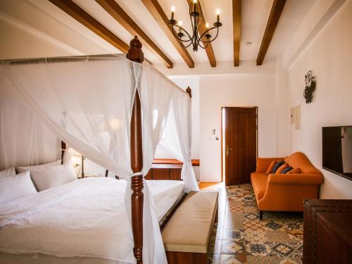 Postel nebo postele na pokoji v ubytování Oasis Hotel
