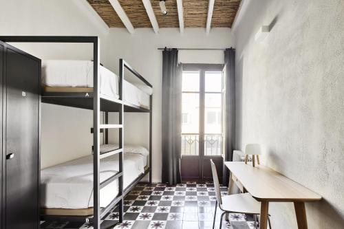Postel nebo postele na pokoji v ubytování The Boc Hostels - Palma