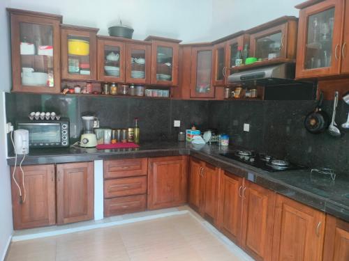 Kuchyň nebo kuchyňský kout v ubytování Spacious Home ideal for Families