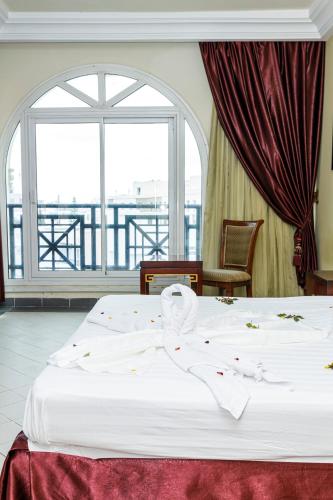 Cama o camas de una habitación en César Palace Sousse