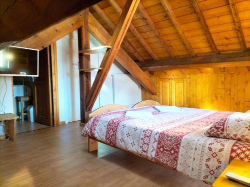 Letto o letti in una camera di Auberge La maison de Catherine