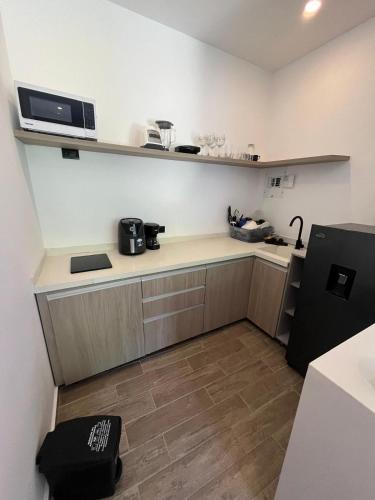 Apartamentos tierrabombaにあるキッチンまたは簡易キッチン