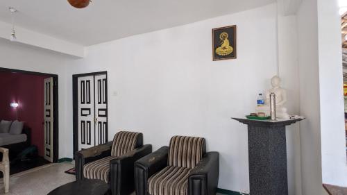Χώρος καθιστικού στο Chill hut home stay