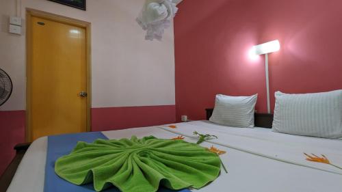 Ένα ή περισσότερα κρεβάτια σε δωμάτιο στο Chill hut home stay