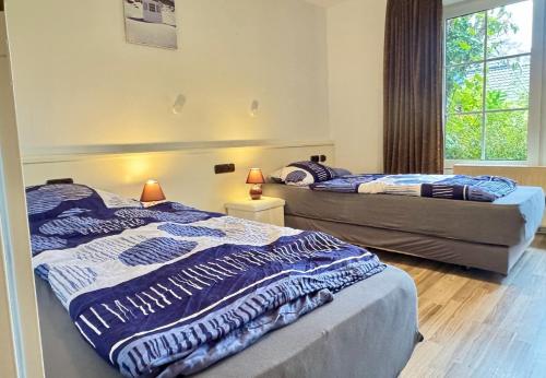 Postel nebo postele na pokoji v ubytování Cozy Ground Floor Retreat in Marx