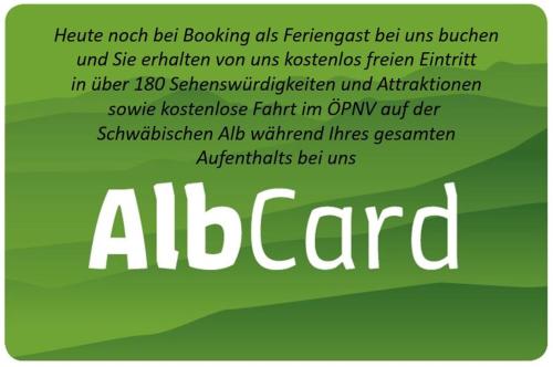 a green and white sign with the word alberadj at Ferienwohnung Pension Waldblick in Heidenheim