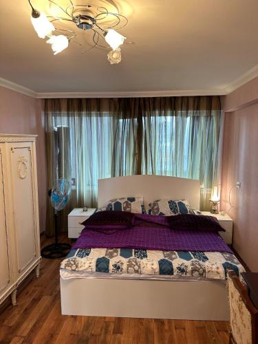 Ένα ή περισσότερα κρεβάτια σε δωμάτιο στο Seaside View Apartment in Baku
