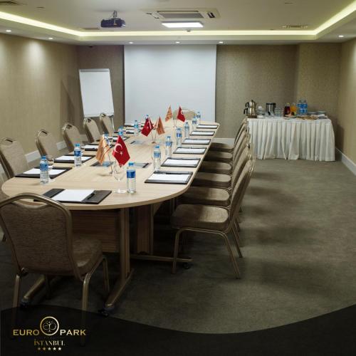 a large conference room with a long table and chairs at Euro Park Otel in Istanbul