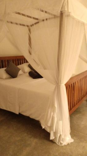 Ένα ή περισσότερα κρεβάτια σε δωμάτιο στο Villa Grove Shadow