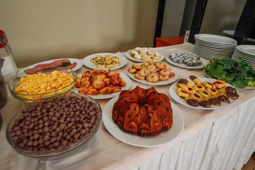 a table with many different types of food on it at Topkapi Golden Time Hotel in Istanbul