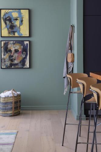 a room with chairs and paintings on a wall at Labotessa Luxury Boutique Hotel in Cape Town