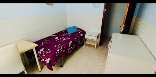 Katil atau katil-katil dalam bilik di Tenerife Homestay
