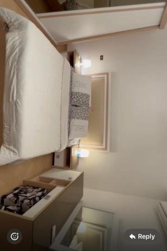 a kitchen with an open box in a room at Panorama Elsherouk Furnished 2 bedroom apartment in Madīnat ash Shurūq