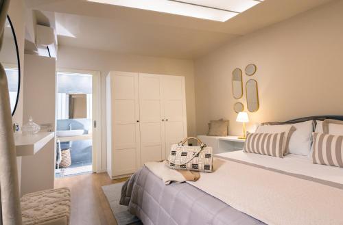 a bedroom with a large bed and a window at Sinatra Suite in Ispica