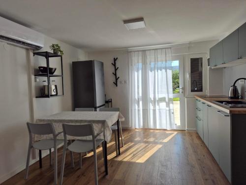Kuchyňa alebo kuchynka v ubytovaní Apartments Maržić