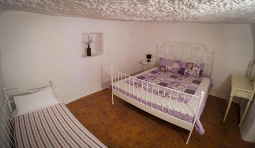 En eller flere senge i et værelse på La Llave