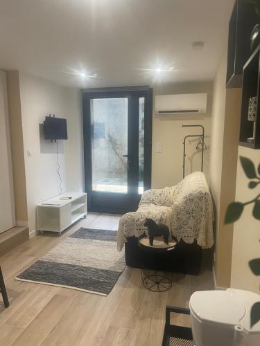 TV a/nebo společenská místnost v ubytování Joli gîte dans une installation équestre