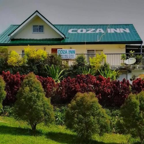 Jardí fora de Coza Inn