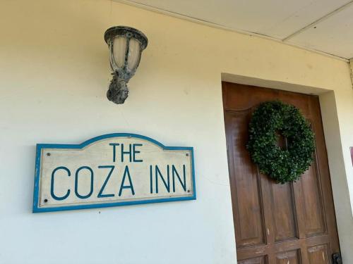 Un certificat, premiu, logo sau alt document afișat la Coza Inn
