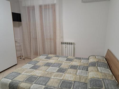 Postel nebo postele na pokoji v ubytování Appartamento Alba