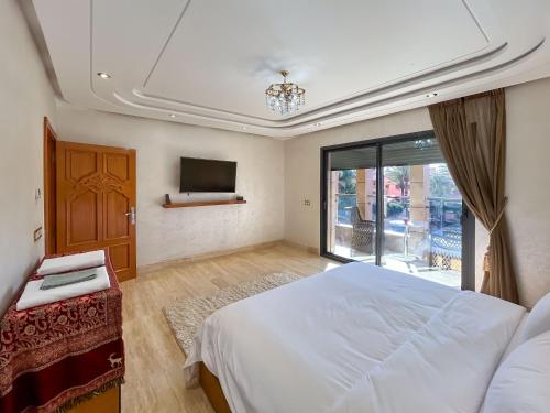 Cama o camas de una habitación en Villa Caprice Palace au centre-ville