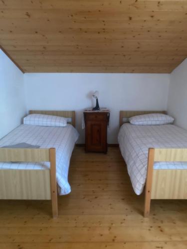 A bed or beds in a room at La casa di nonno carlo