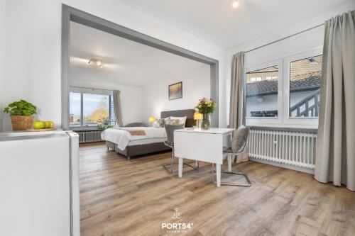 Postel nebo postele na pokoji v ubytování Apartment 21