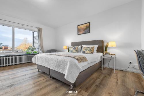 Postel nebo postele na pokoji v ubytování Apartment 21