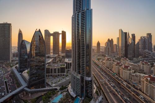 a view of a city with skyscrapers at Fashion avenue Dubai Mall -The Residence in Dubai