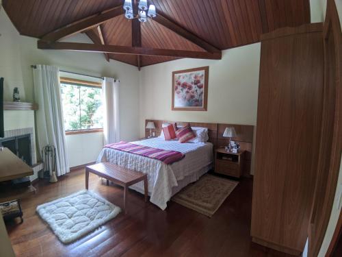 Ένα ή περισσότερα κρεβάτια σε δωμάτιο στο Caluan Apartment