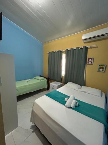 Katil atau katil-katil dalam bilik di Pousada Brisa de Paraty ll