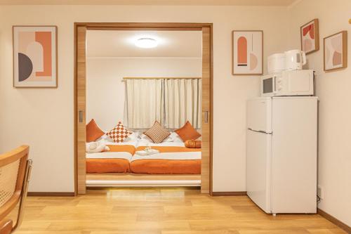Katil atau katil-katil dalam bilik di Shinjuku 2 stops new mansion free WiFi nakano area
