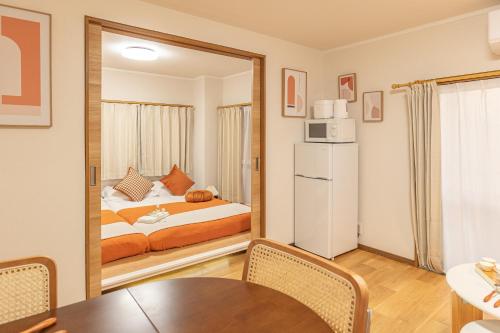 Katil atau katil-katil dalam bilik di Shinjuku 2 stops new mansion free WiFi nakano area