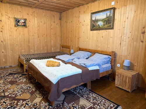 Postel nebo postele na pokoji v ubytování Hotel Zlagoda